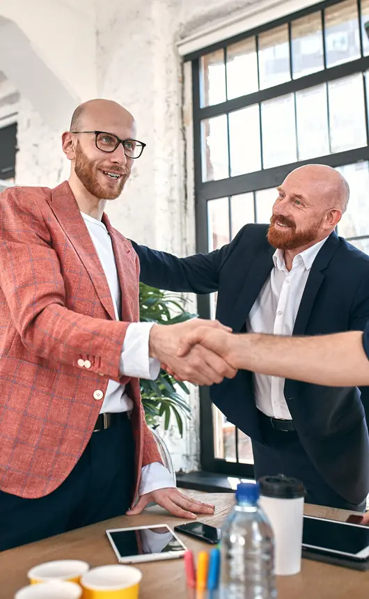 Business partners shaking hands
